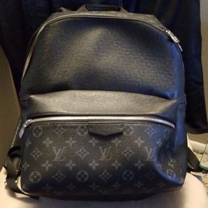 Black and gray louise Vuitton  backpack